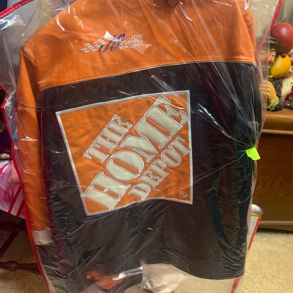 The is a Home Depot NASCAR Racing Jacket. It’s Tony Stewart size is a small